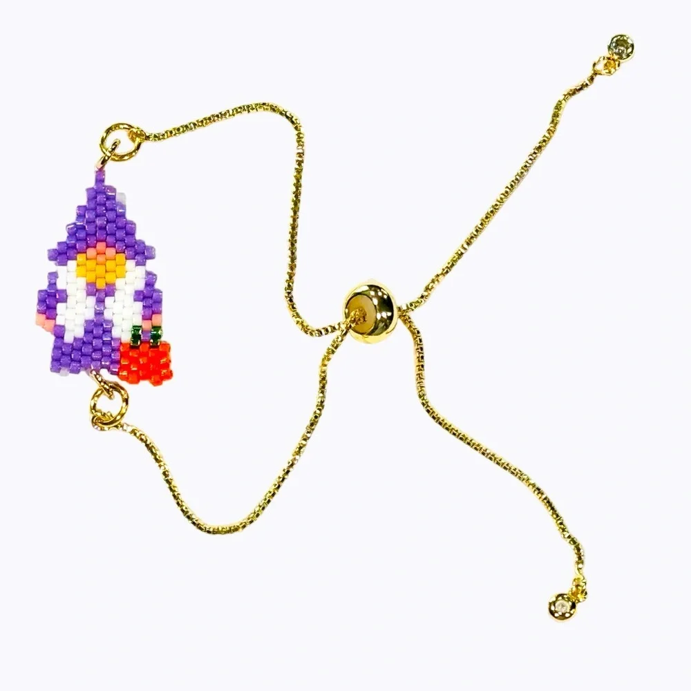 Handcrafted beaded Halloween gnome with pumpkin slider bracelet adjustable